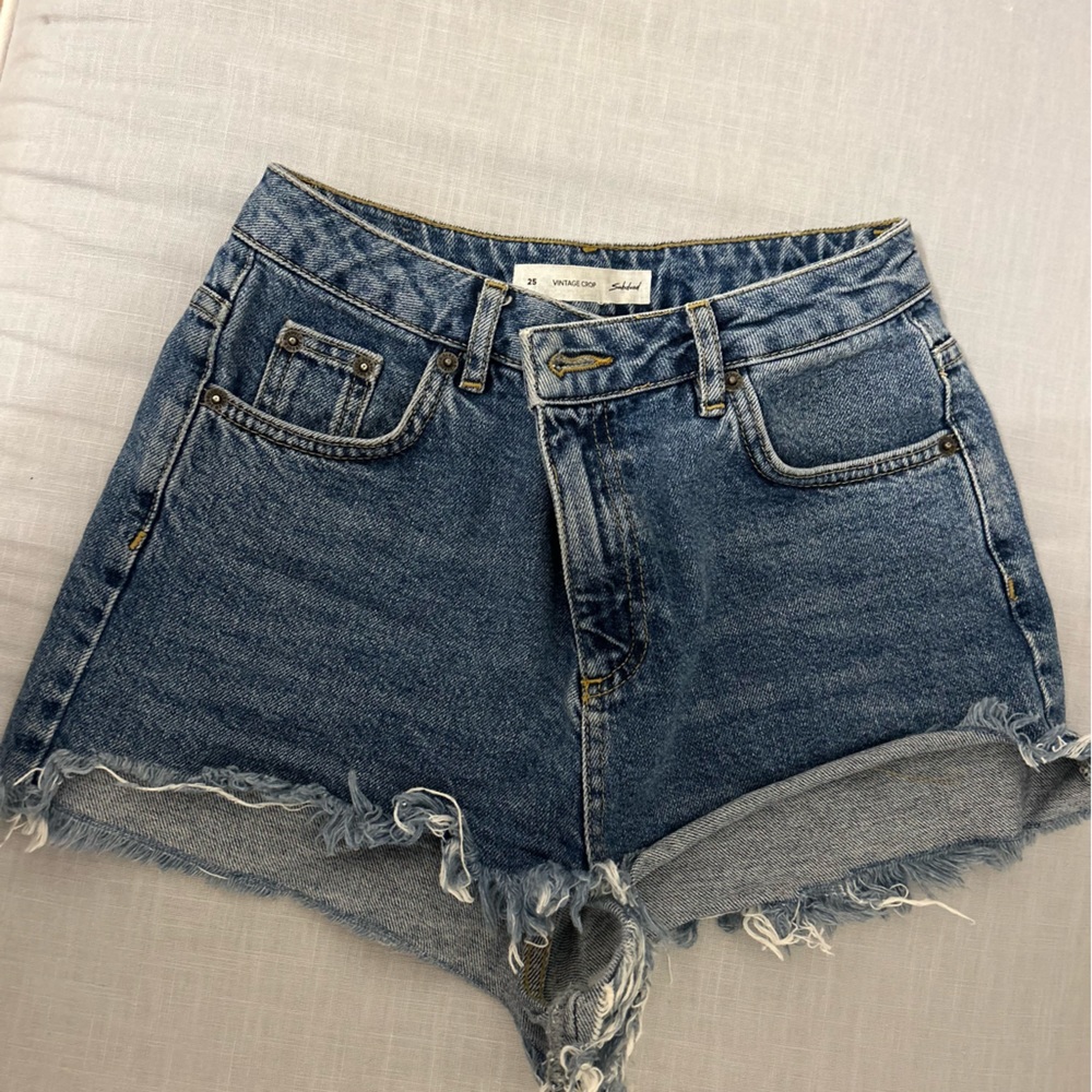 Subdued blue jean shorts